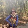 Mvs sitting in a park in South Carolina with an adoptable dog – featured image for blog post on client boundaries